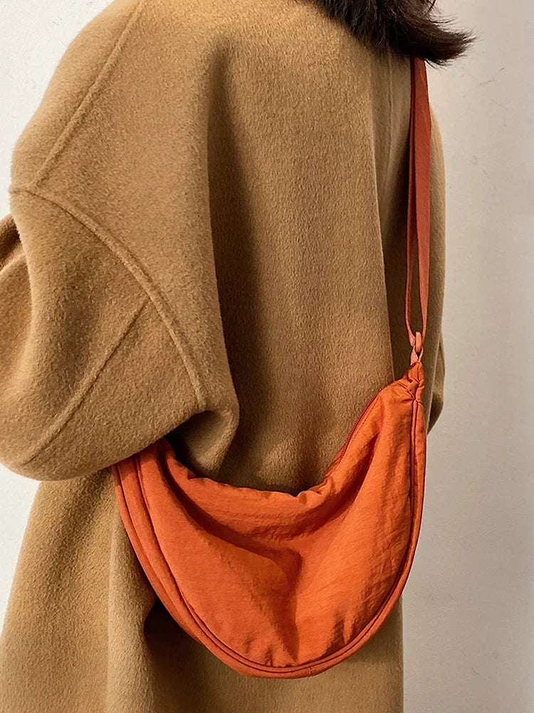 Lightweight Crossbody Bag with One Roomy Compartment | Dumpling Shape Shoulder Sling for Work, Shopping or a Day Out | Eight Colors