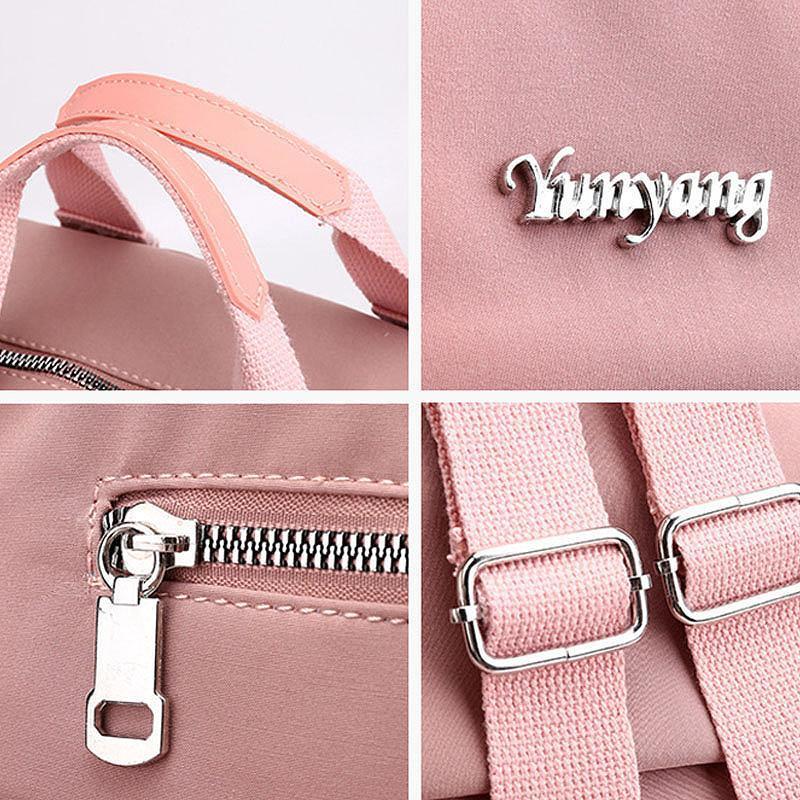 Travel Backpack in Water Resistant Oxford Fabric | Tablet Pocket, Phone Slot and Several Compartments | 28 by 36 by 12 cm
