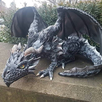 Gothic dragon accent sculpture displayed on a patio