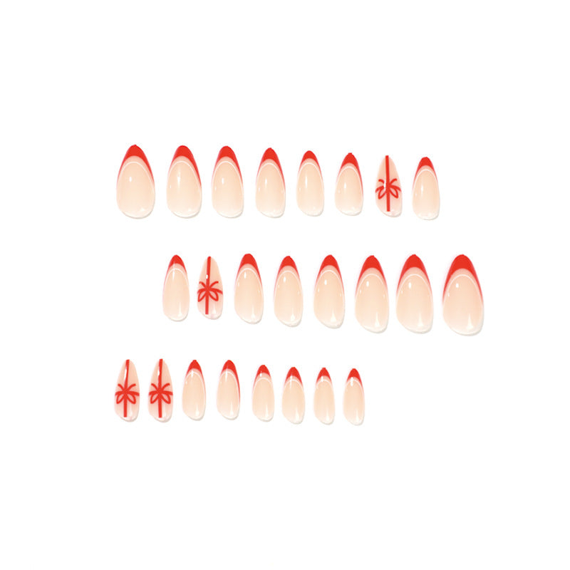 Stiletto Christmas Nails with Red Tips and Bow Motifs | Acrylic Press On Nail Set | Festive Manicure for Winter Parties
