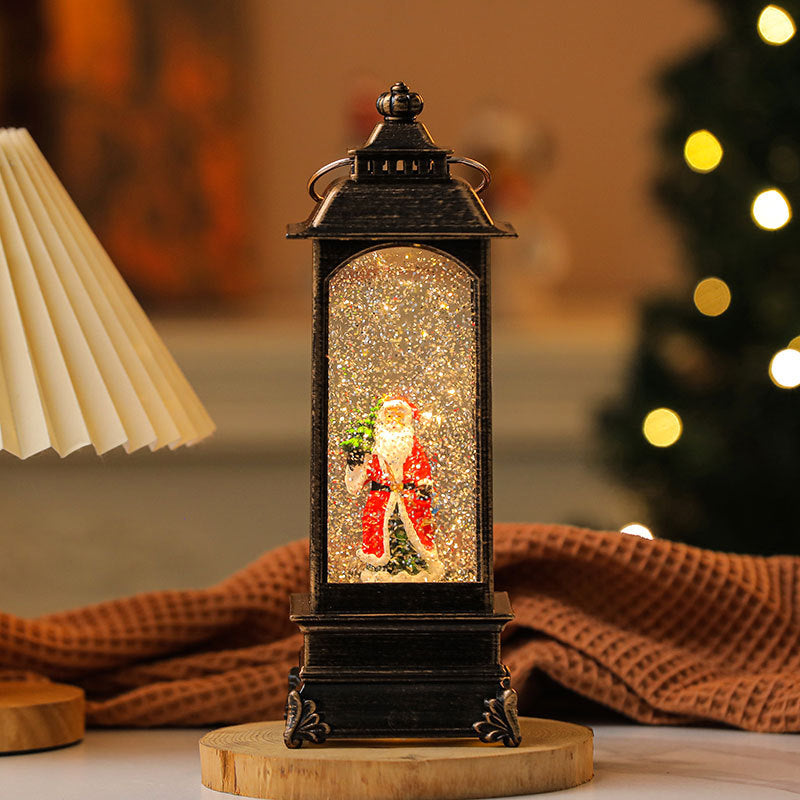LED Lantern with a Santa Figurine Holding a Fir Tree | Shimmering Glitter Around the Scene | Warm Christmas Tabletop Light