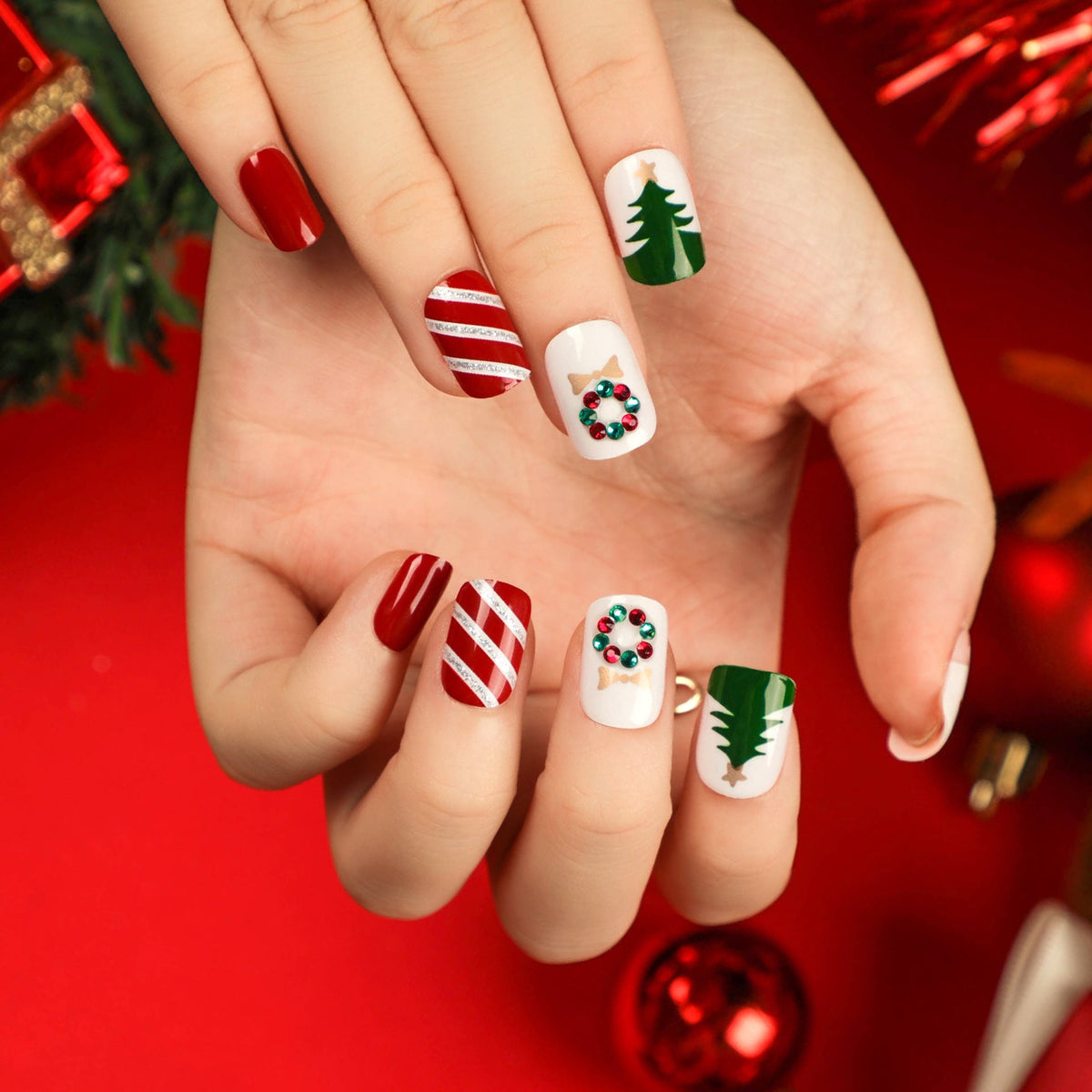 Christmas Nail Designs with Trees and Garlands | Press On Fake Nails in Pink | Glossy Xmas Manicure for Festive Parties