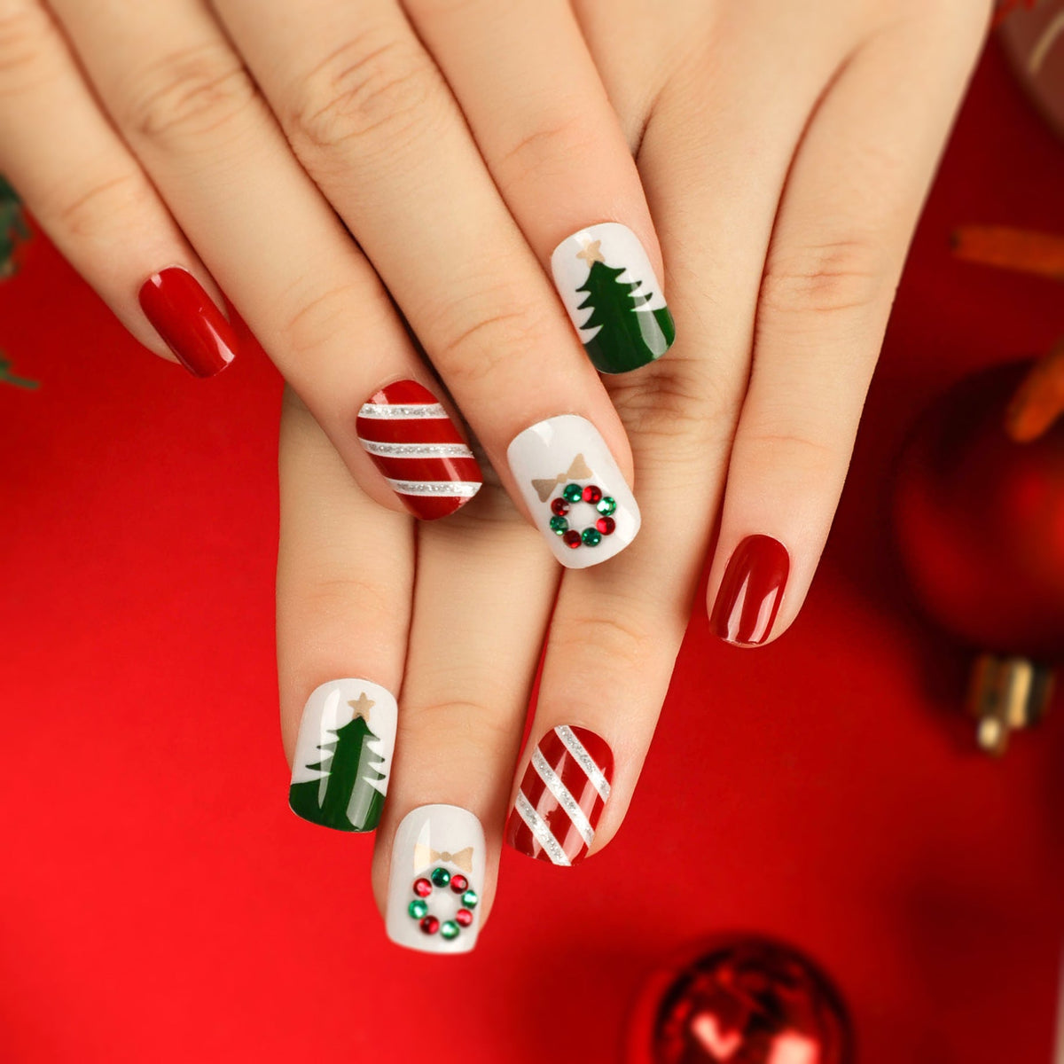 Christmas Nail Designs with Trees and Garlands | Press On Fake Nails in Pink | Glossy Xmas Manicure for Festive Parties