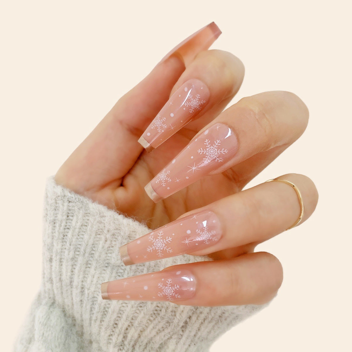 Snowflake Christmas Press-On Nails in Sheer Nude Pink | Long Coffin Tips with White Detail | Salon Look at Home