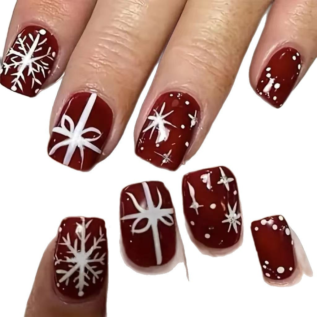 Christmas Press-On Nails in Deep Red with White Snowflakes | Festive Bow Motifs | Non-Toxic Build, Glossy Wear