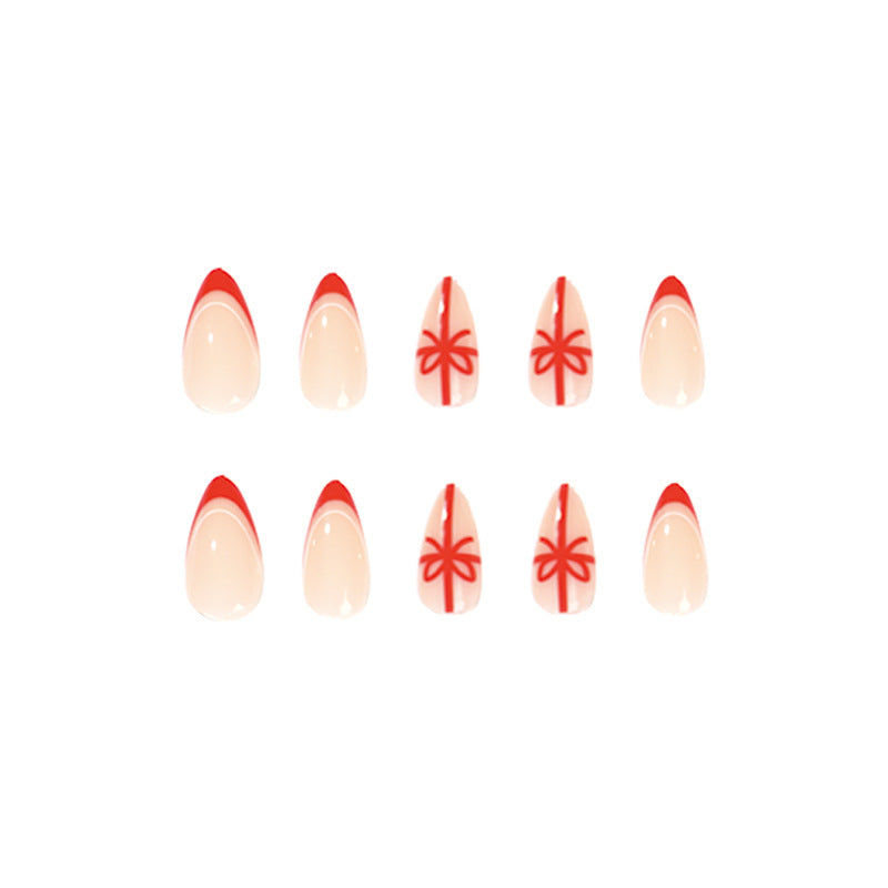 Stiletto Christmas Nails with Red Tips and Bow Motifs | Acrylic Press On Nail Set | Festive Manicure for Winter Parties