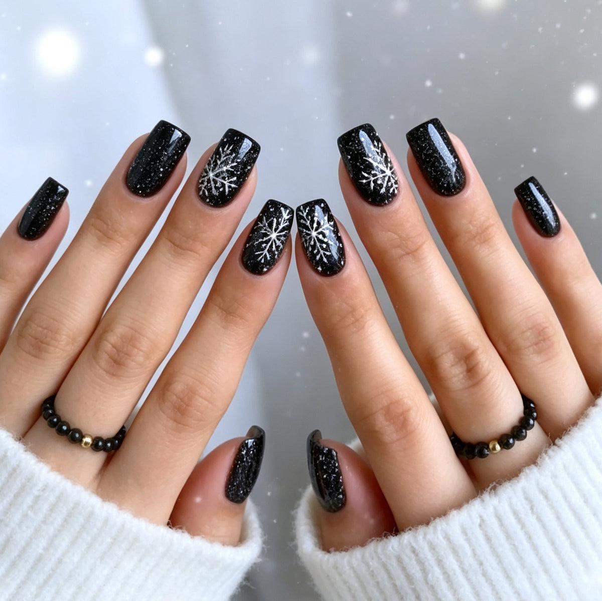 Black Christmas Nails with White Snowflake Art | Long Press-On Tips in a Glossy Finish | Elegant Pick for Winter Parties