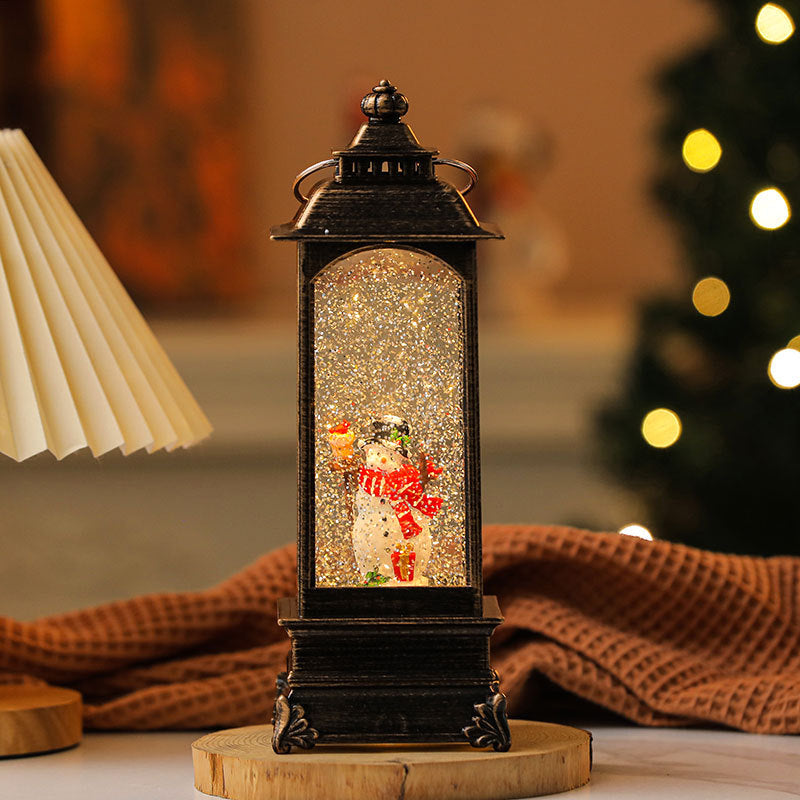 LED Lantern with a Santa Figurine Holding a Fir Tree | Shimmering Glitter Around the Scene | Warm Christmas Tabletop Light