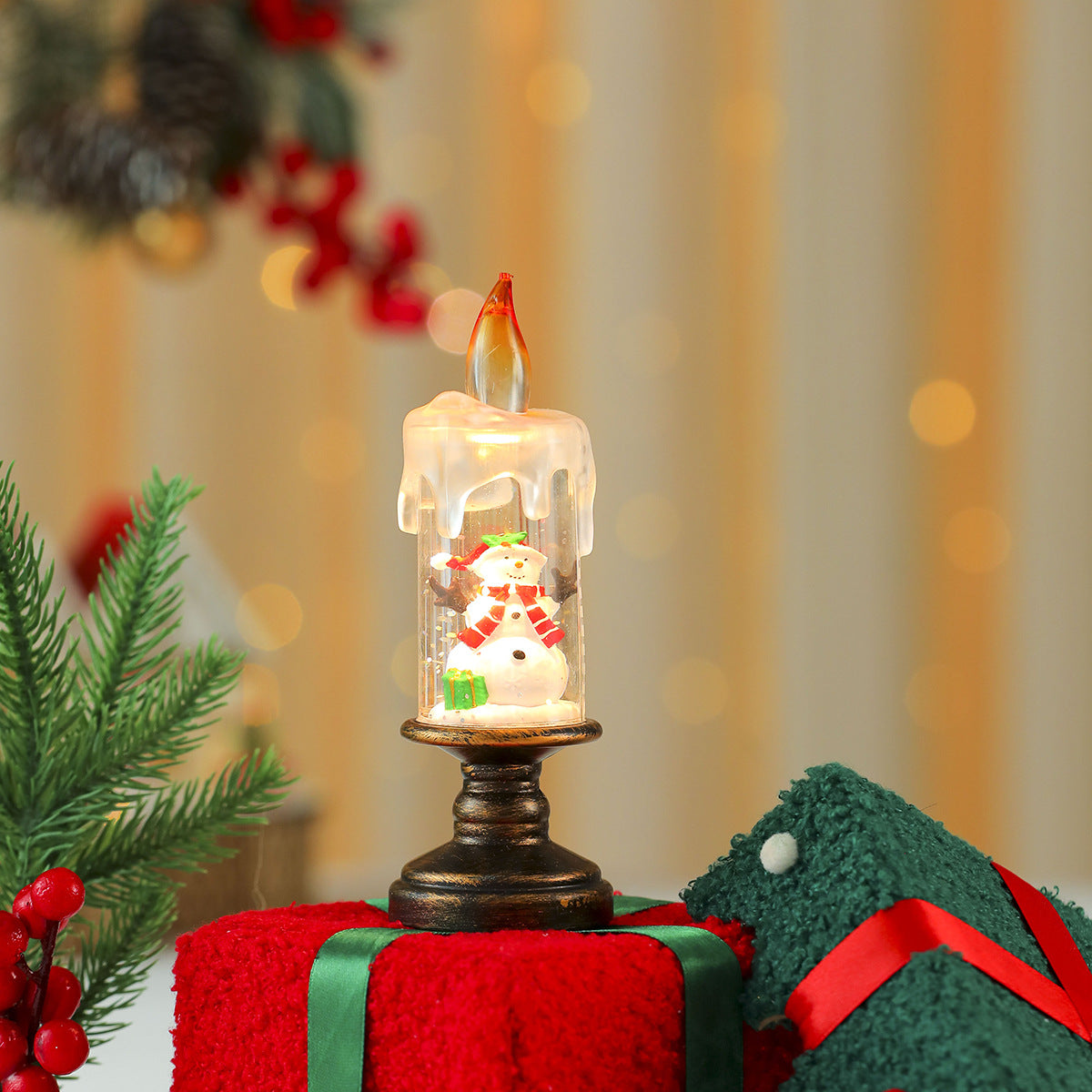 LED Christmas Candle Lights with a Santa or Tree Figure Inside | Warm White Glow on a Brass Look Stand | Switch Under the Base