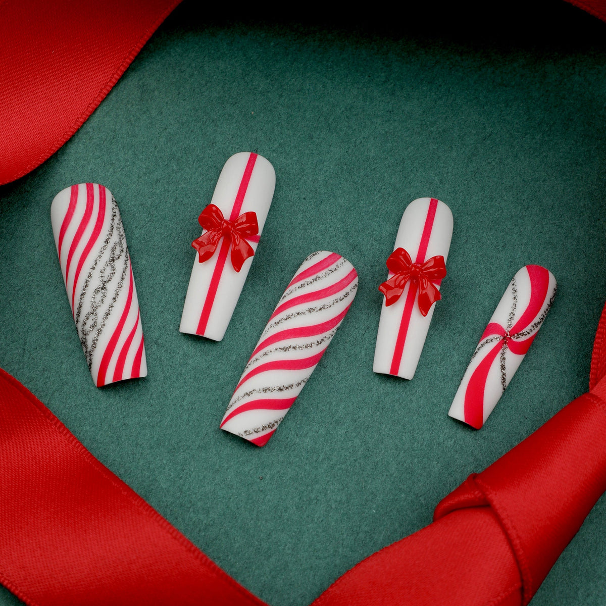 Candy Cane Christmas Press-On Nails in Red and White | Bow and Silver Accent Tips | Durable Acrylic for Festive Parties