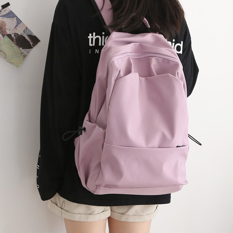 Travel Backpack with Padded Laptop Compartment | Water-Repellent Daypack with Front Pocket | 4 Colors