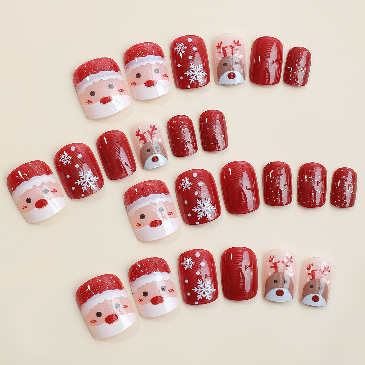 Christmas Nails with Reindeer and Snowflake Motifs | 24 Press On Fingernails in Mixed Sizes | Reusable Kit with Adhesive Tabs