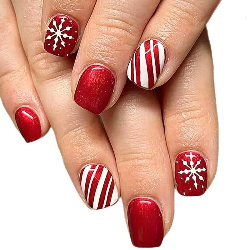 Festive Christmas Nails in Red with Candy Cane Stripes | Snowflake Accent Tips | Smooth Press-On Application