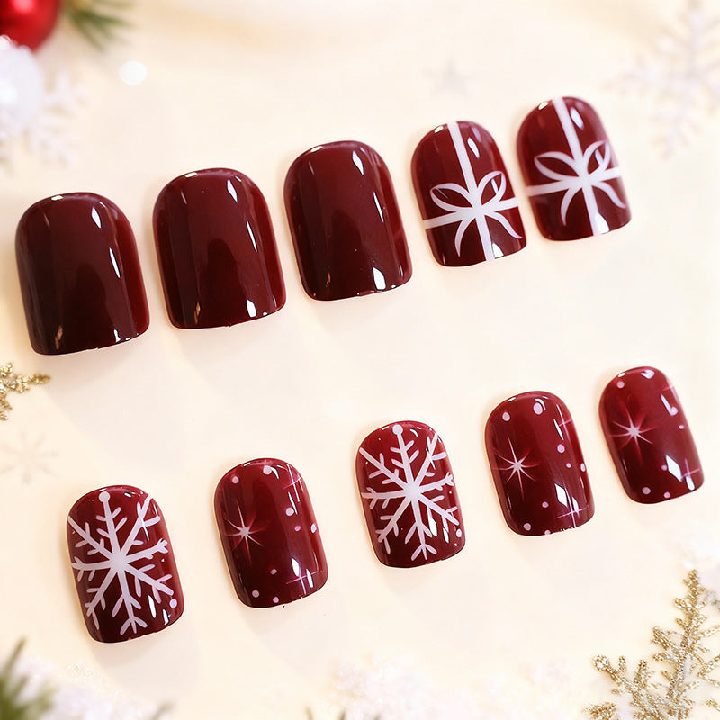 Christmas Press-On Nails in Deep Red with White Snowflakes | Festive Bow Motifs | Non-Toxic Build, Glossy Wear