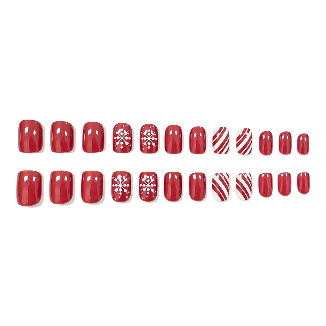 Festive Christmas Nails in Red with Candy Cane Stripes | Snowflake Accent Tips | Smooth Press-On Application