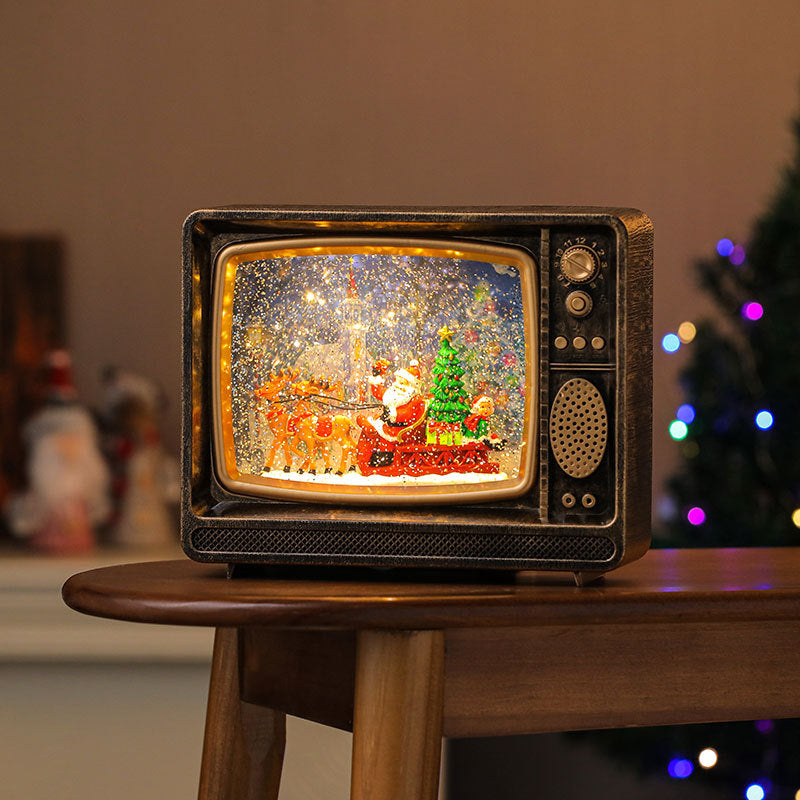 LED Lantern with a Santa Figurine Holding a Fir Tree | Shimmering Glitter Around the Scene | Warm Christmas Tabletop Light