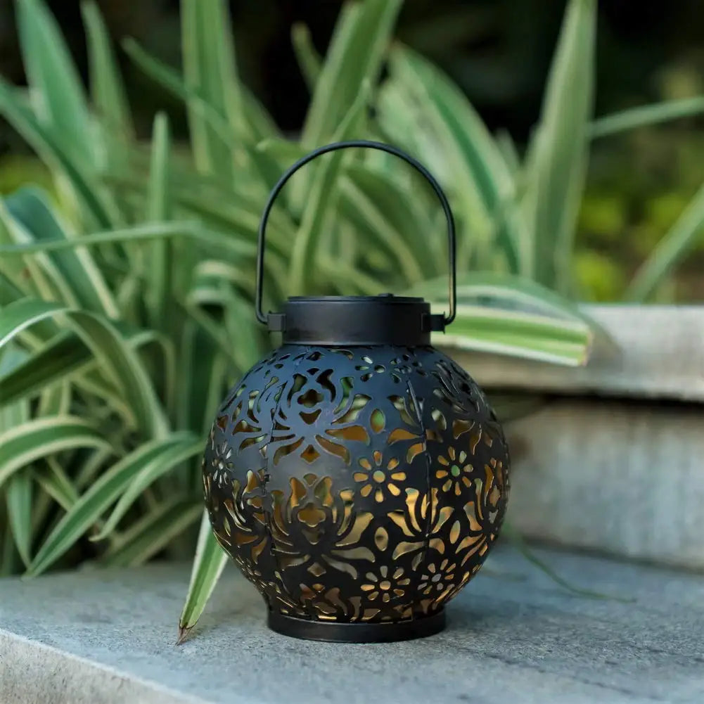 Hanging solar lantern lighting a patio at night