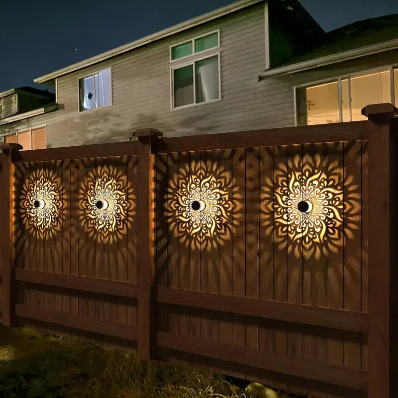 Decorative solar lamp lighting an outdoor entrance for a holiday display