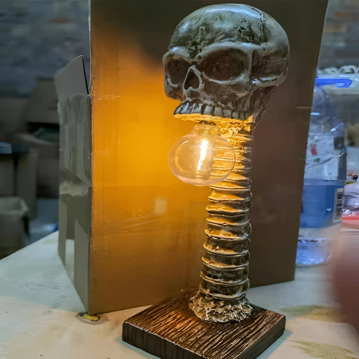 Skeleton spine lamp styled with dark Halloween decor