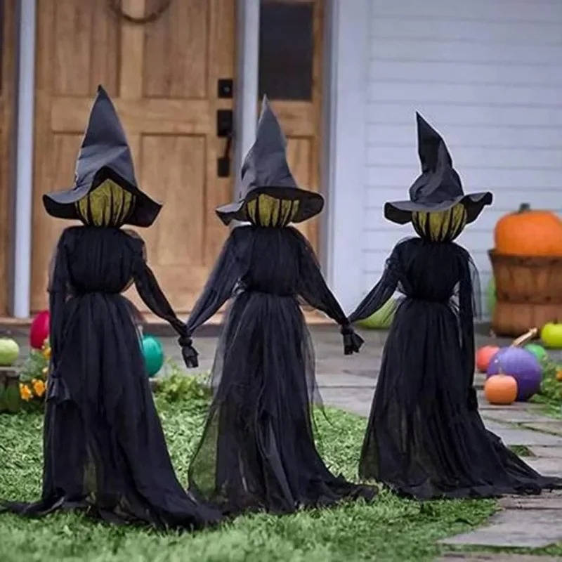 Witch trio arranged in a circle for a Halloween display