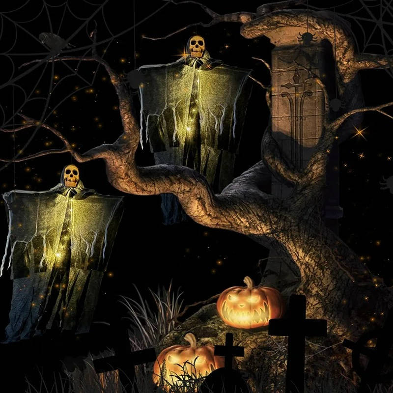 Halloween skull decoration glowing at dusk in a yard