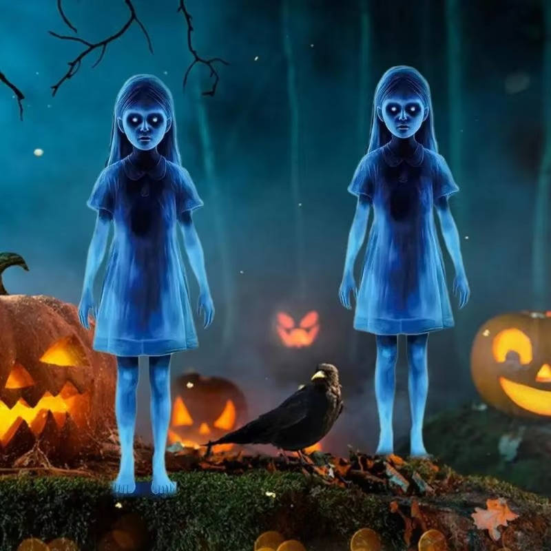 Girl ghost Halloween yard stakes standing in a courtyard