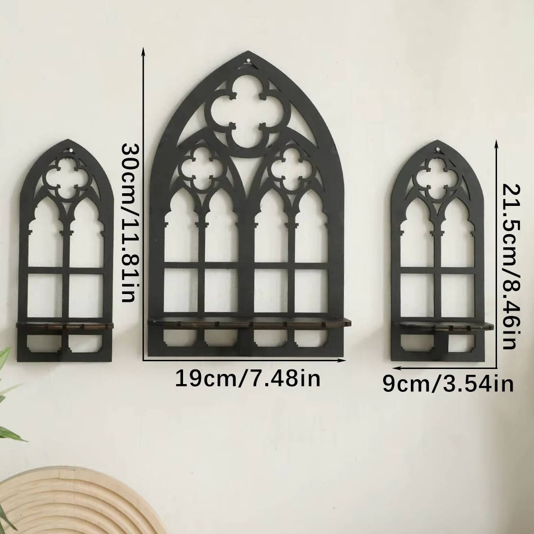 Three piece gothic arch wall decoration set on a plain wall
