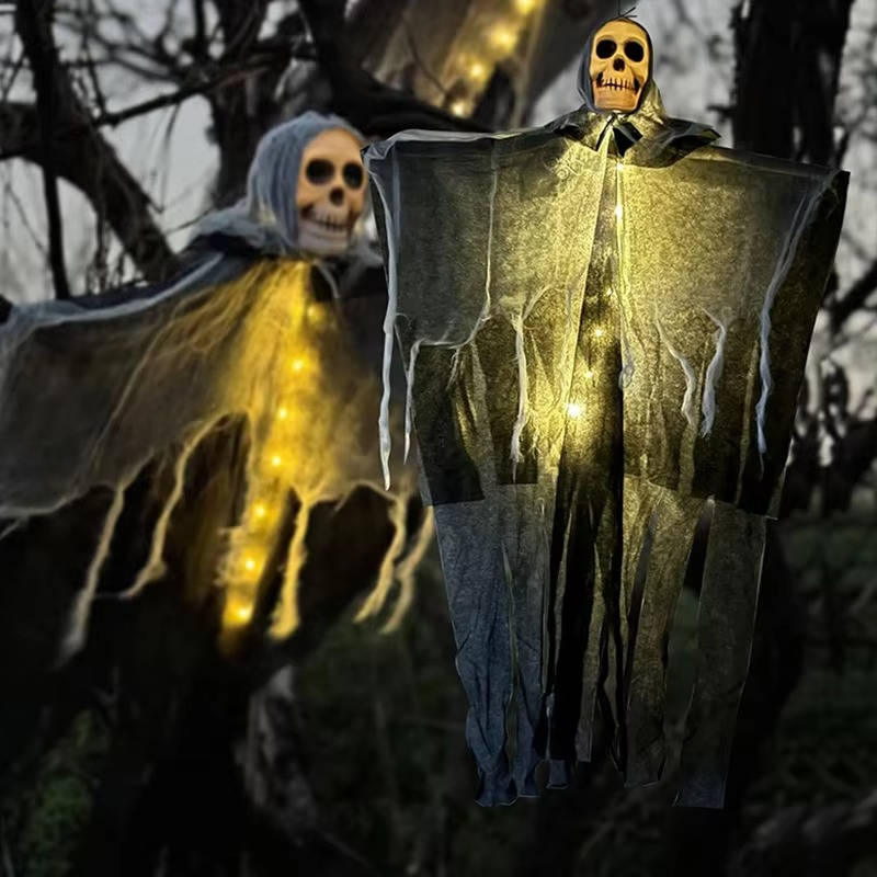 Set of two hanging Halloween skull decorations with LED glow