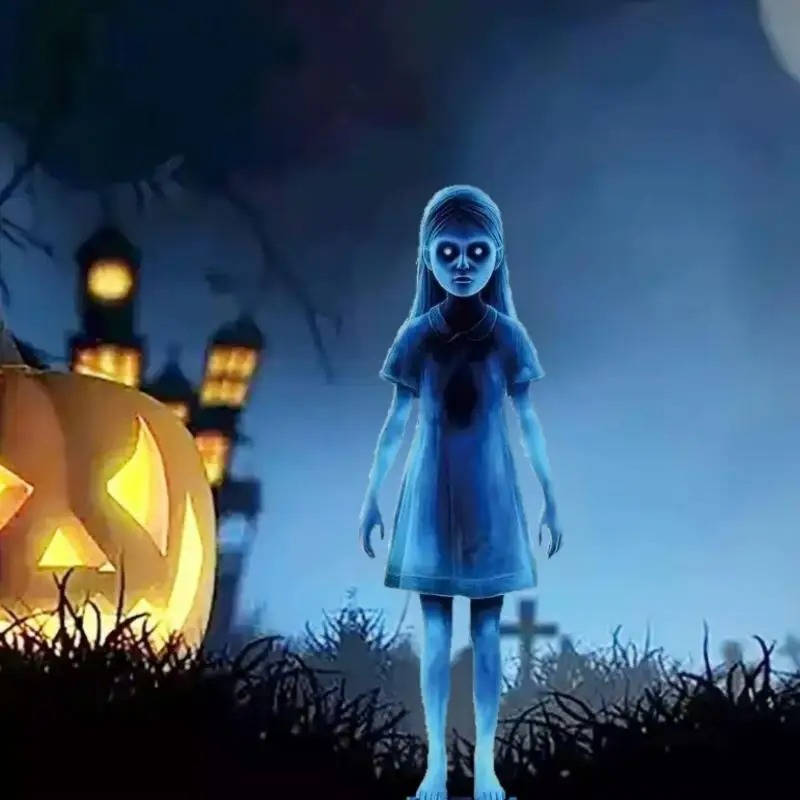 Pair of ghost lawn figures staked into a garden bed