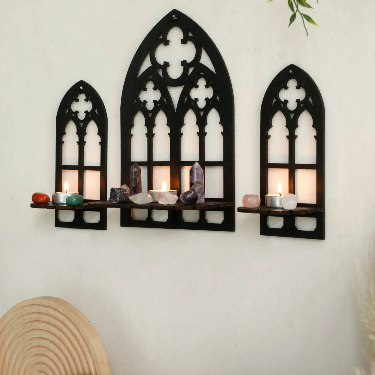 Set of three wooden cathedral arch wall frames mounted together