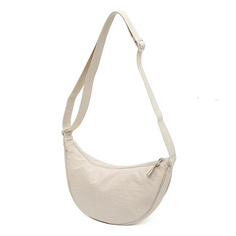 Lightweight Crossbody Bag with One Roomy Compartment | Dumpling Shape Shoulder Sling for Work, Shopping or a Day Out | Eight Colors