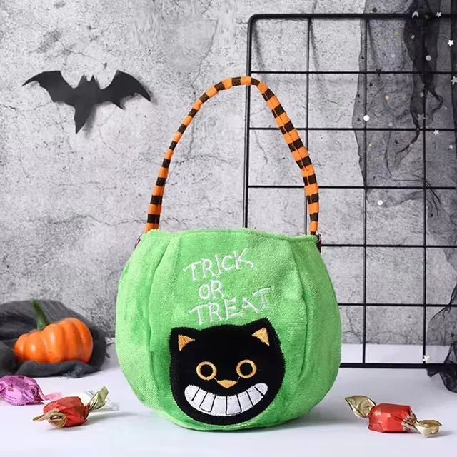 Green pumpkin-shaped Halloween treat bag for kids with adjustable strap