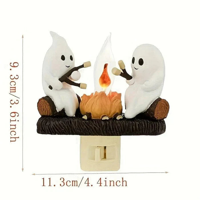 Halloween ghost bonfire night light lit in a dim bedroom