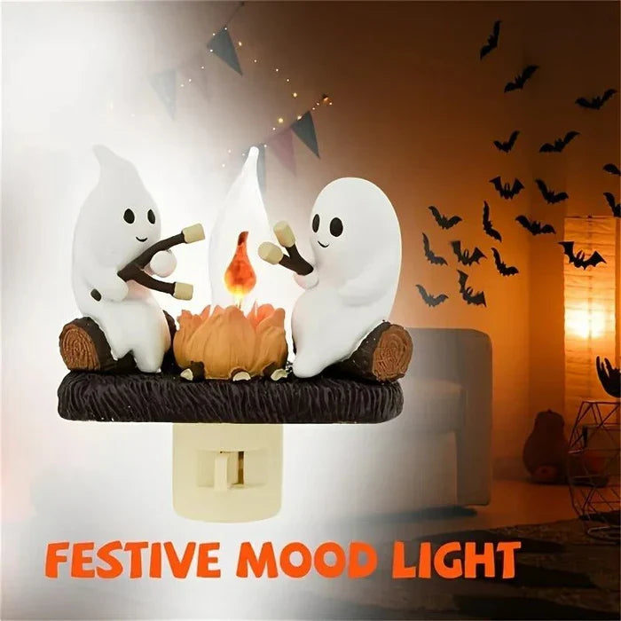 Ghost bonfire night light glowing on a dark tabletop