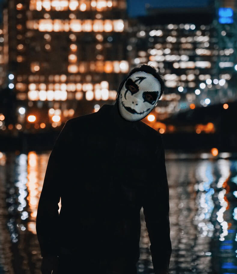 LED costume mask worn at a party with colored lights