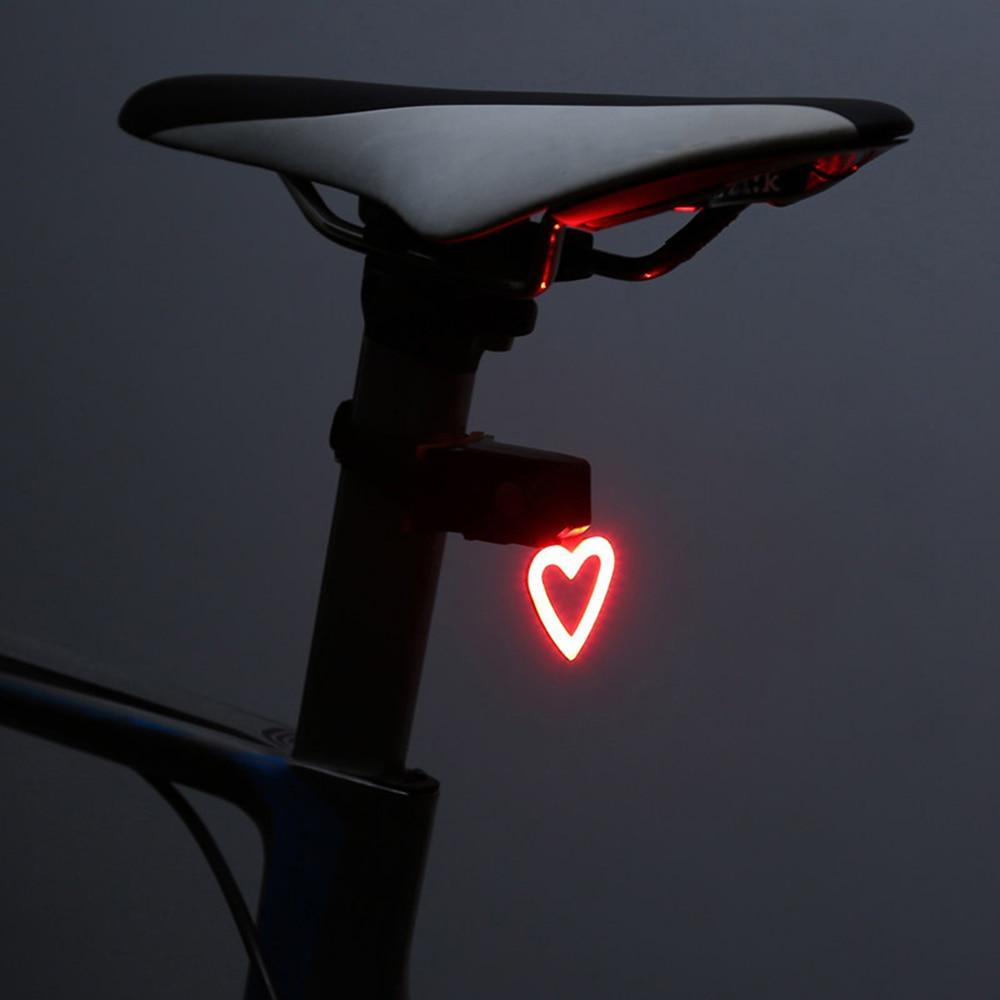 LED Bike Light in Four Shapes, a Ring, Bone, Heart or Triangle | Five Modes from Steady to Flashing | Waterproof ABS, USB Charged