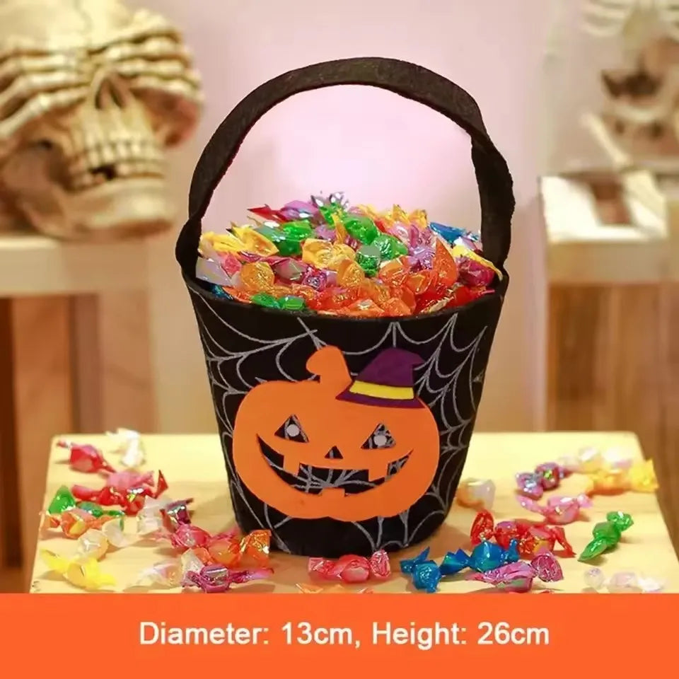 Halloween candy bucket with spider web pumpkin design and carry handle